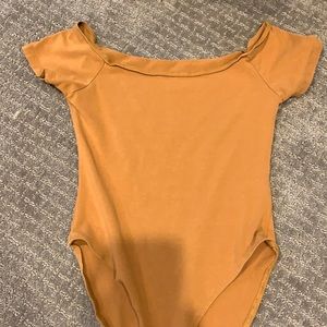 orange/brown bodysuit